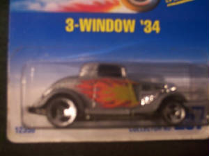 34fordcoupesilverredflame.jpg
